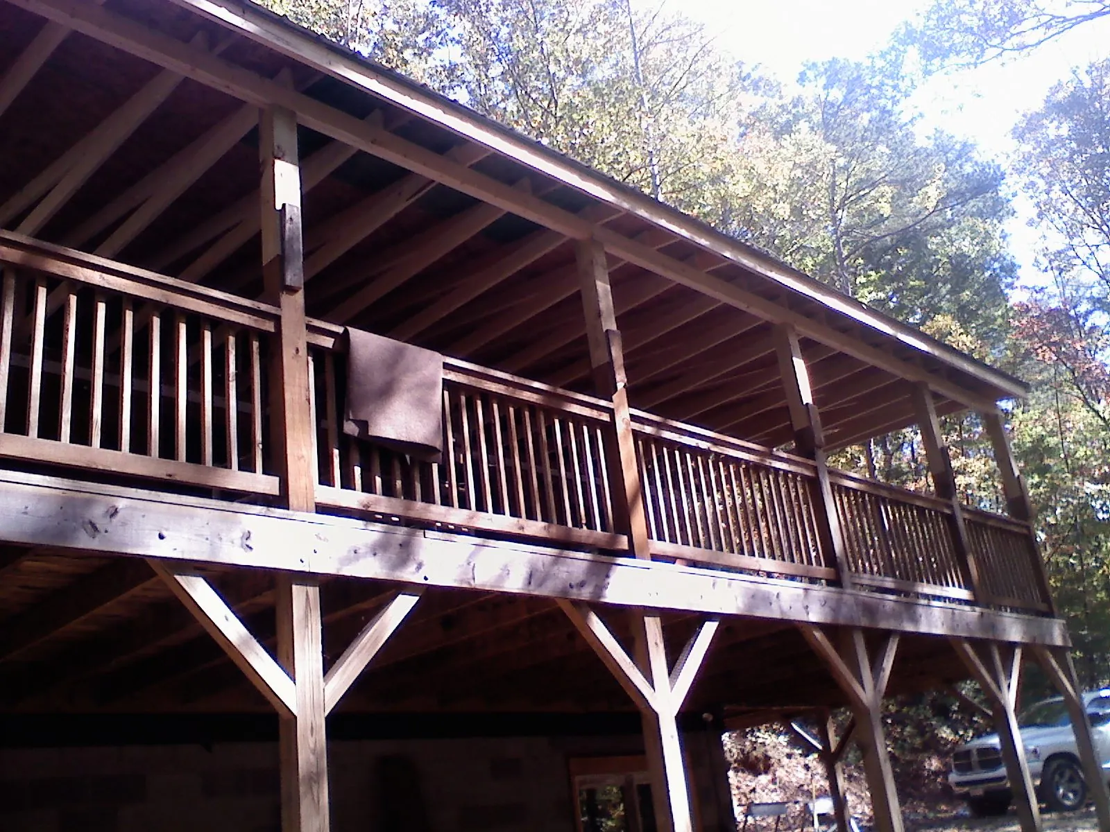Timber framing under a new elevated porch and deck — Roof Leak Repair in Robertsville by Roofing Brothers